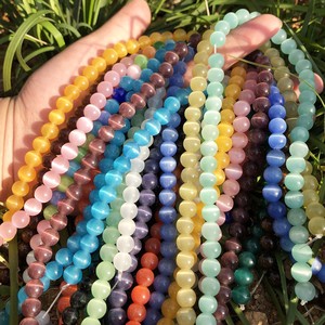 Cuentas de cristal de ojo de gato lisas redondas sueltas de selenita sintética tratada de alta calidad para la fabricación de joyas DIY - Product Image 2