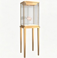 Vitrine à bijoux verticale de luxe en or avec éclairage LED, vitrine moderne en verre trempé pour les magasins de détail