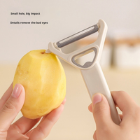 Éplucheur multifonction ergonomique tendance à double usage, couteau à fruits avec ouvre-bouteille, grattoir à peau de légumes pour la cuisine à domicile