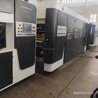 Machine d'impression flexographique, de découpe, de pliage, de collage et de cerclage en ligne pour l'industrie informatique