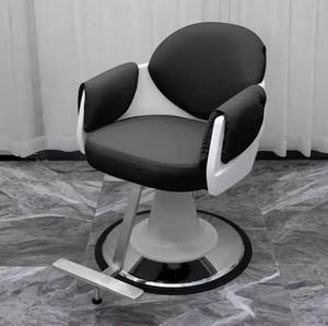 Sillón de Barbería Moderno Tapizado en Negro, Giratorio y Reclinable, para Corte y Estilismo de Cabello, Mueble Resistente para Salón de Belleza - Product Image 1