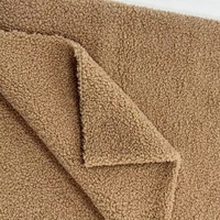 Tissu en velours doux en peluche Teddy 100% tissu polaire en polyester pour manteau d'hiver à la mode ours en peluche