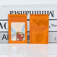 Sachet d'emballage personnalisé mini transparent holographique rose refermable anti-odeur pour aliments, boucles d'oreilles et lunettes