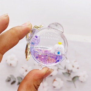 Porte-clés en acrylique avec liquide et <span class=keywords><strong>sable</strong></span>, motif Cinnamoroll chien bleu aux grandes oreilles, jouet en peluche flottant, petit pendentif dessin animé mignon irrégulier - Product Image 4