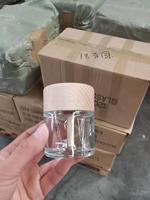 Bouteille de parfum en verre ronde vide de 50ml avec bouchon en bois pour voiture pour diffuseur de roseaux ou parfums de voiture personnalisés