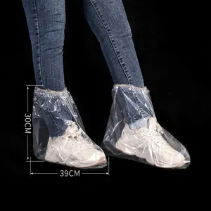 Haute qualité blanc long au genou jetable Pe résistant à l'eau en plastique anti-poussière imperméable PE couvre les bottes de pluie en silicone