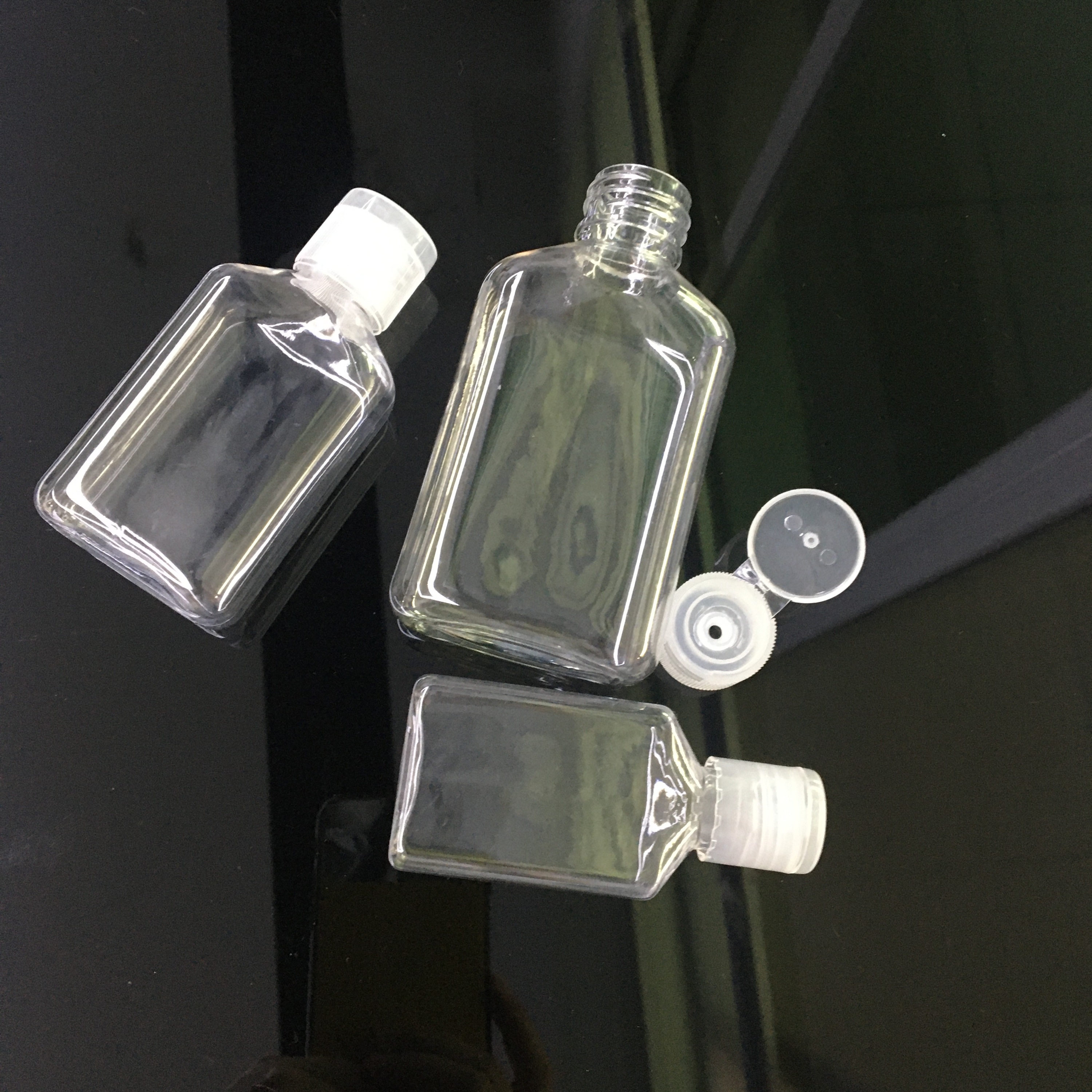 Botella de mascota con claro tapa flip top 30 ml 50 ml 100ml para botella de desinfectante de manos alcohol entrega rápida