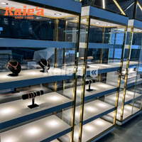 Vitrine à bijoux en verre avec cadre doré luxueux, éclairage LED, présentoir intelligent pour lunettes, adapté aux boutiques et centres commerciaux