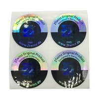 Autocollants circulaires holographiques noirs personnalisés, petites étiquettes rondes laser sur feuilles