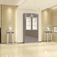 Vitrina moderna de lujo, marco de aluminio acrílico de vidrio templado, luz LED para cosméticos, relojes, teléfonos móviles, centros comerciales