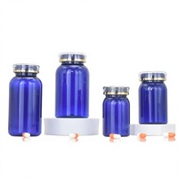 Flacon de complément alimentaire en PET bleu de 200 cc avec couvercle couronne double couche et épaule arrondie, imprimé en sérigraphie, pour fabricants