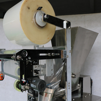 Machine d'emballage automatique de sachet de thé de fleur pyramidale de triangle en nylon