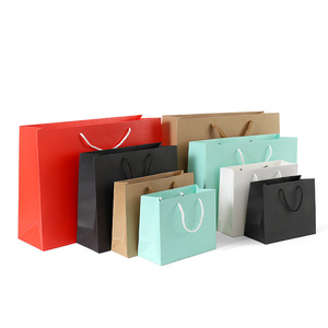 Venta caliente llena de colores marrón blanco logotipo personalizado mango de <span class=keywords><strong>tela</strong></span> bolsas de papel de Kraft para regalo y <span class=keywords><strong>ropa</strong></span> - Product Image 3
