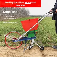 Nouveau semoir de maïs à arachide poussé à la main intégré soja sésame oléagineux planteur d'engrais Machine pour une plantation efficace