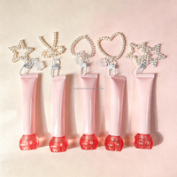 Tube de gloss sphérique avec couvercle à vis, tube cosmétique à air comprimé avec chaîne, tube de crème pour les yeux avec applicateur en silicone souple