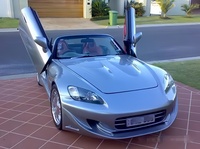 Kit carrosserie aérodynamique TOPMIX pour Honda S2000 AP1, style Veilside, comprenant pare-chocs avant, pare-chocs arrière, jupes latérales et extensions d'ailes.