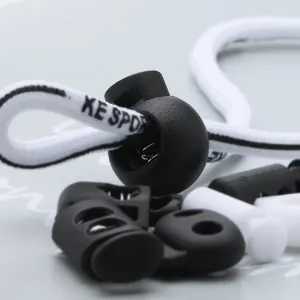 Hot sales spring buckle white and black drawstring toggle Adjustable plastic peg stopper