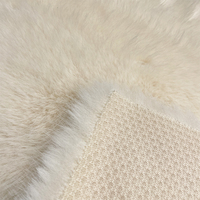 Hochwertiger 100% Polyester gestrickt Kunstnerz-Minkfell luxuriöser weicher Stoff für Damenmantel 75d Garnzahlen