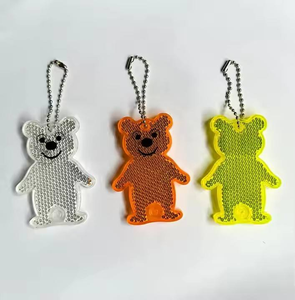 Llavero de PVC reflectante de alta visibilidad, colgante de bolsa de tira con patrón circular con regalo promocional de publicidad segura y ligera - Product Image 1