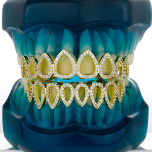 Grillz para dientes con forma de lágrima, incrustaciones de circonita, en oro y plata, accesorios dentales unisex para uso diario. - Product Image 3