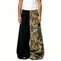 Pantalon de jogging ample pour homme, patchwork vert olive et camouflage feuilles, couleur contrastante, style streetwear, coupe oversize