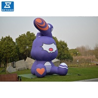 Modèle d'art gonflable personnalisé en forme de lapin violet pour la publicité d'événements en plein air, la décoration, la promotion de la marque et l'affichage