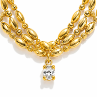 Collier en acier inoxydable plaqué or PVD 18 carats avec pendentif zirconium en forme de perles ovales souriantes, vente en gros