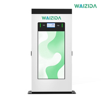 Chargeur AC pour véhicules électriques 44 kW à double borne, fixation au sol, écran publicitaire 43 pouces, paiement NFC POS, IP54 Type 1/2 J1772 pour centres commerciaux, restauration et parkings