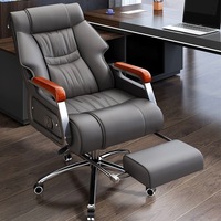 Chaise de bureau moderne minimaliste en cuir véritable, avec fonction massage et base en acier inclinable, confortable pour les longues heures de travail sur ordinateur à domicile