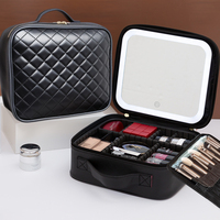 Valise de voyage professionnelle personnalisée en usine avec miroir LED, sac en cuir imprimé léopard, sangle de valise, fermeture éclair cosmétique, grande boîte portable