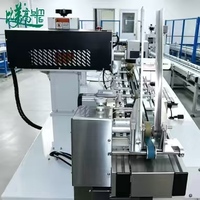 Machine de marquage laser automatique compacte avec lecteur de codes industriel de haute précision pour cartes russes