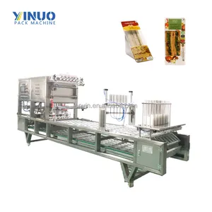 Fábrica de maquinaria de embalaje y sellado de bandeja de vacío automática multifunción de alta velocidad Yijianuo suministrada en China