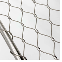 Maille de câble en acier inoxydable tressée ou nouée de type ferrule flexible 304/316 pour clôture de zoo et volière