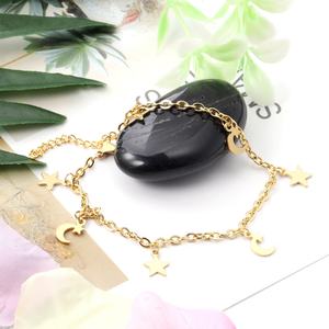 Chaîne de cheville en acier inoxydable plaqué or 18 carats avec motif étoiles et lune pour femme - Product Image 1