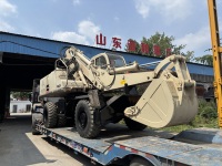 Excavatrice sur pneus d'occasion YH-210-E avec moteur Cummins et boîte de vitesses - Garantie 1 an, capacité de la benne de 0,9 m³, poids de 21 000 kg