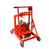 Petite machine manuelle de fabrication de blocs creux QMR2-45 avec moteur pour béton, sable, pierre, ciment, matière première