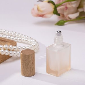 Subbotella de perfume de vidrio esmerilado de colores de 10 ml, botella de spray para aceite esencial de nuez, botella de perfume con tapa de borla estilo chino - Product Image 3