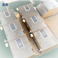 Machine à coudre automatique DN-K003 pour la pose de boutons, la fixation de boucles, la pose de fils élastiques thermofusibles et le nouage de fils