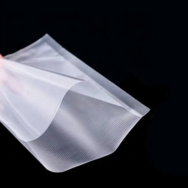 Vente en gros sacs sous vide en plastique avec logo imprimé personnalisé sacs d'emballage sous vide en plastique sous vide en nylon de qualité alimentaire congelé gaufré