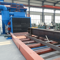 Machine de sablage à convoyeur à rouleaux automatique pour structures en acier, ligne de décapage de la rouille pour tuyaux continus et poutres en H de grande capacité