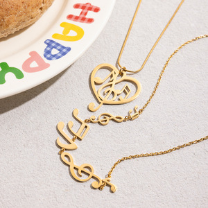 Collier pendentif ajouré en forme de note de musique en acier inoxydable plaqué or 18 carats unisexe pour tous les jours - Product Image 4