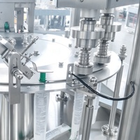 Machine de remplissage et de bouchage de sachets à bec verseur rotatif, automatique pneumatique haute vitesse pour l'emballage de lait de soja, de jus, de pulpe de fruits et de boissons