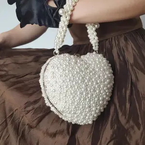 2023 fashion design Hand Beaded luxury evening bags pearls bridal beaded women unique heart clutch tote purse