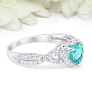 แหวนแต่งงาน/หมั้น ดีไซน์ใหม่ล่าสุด เงินแท้ S925 ประดับเพชร CZ ทรงกลม และพลอยพาราไบต์ทรงรี ดีไซน์เกลียว - Product Image 6