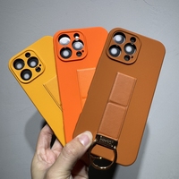 Coque de téléphone de support de dragonne invisible de conception nouvelle pour iPhone 11 12 13 14 15 16 Pro Max avec des couvertures de sensation de peau d'anneau en métal