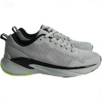 Sneakers de sport en mesh noir avec accents rouges, unisexes, respirantes, légères, semelle antidérapante