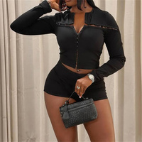 Ensemble 2 pièces sexy : Crop top à manches longues ajouré avec crochets métalliques et short moulant