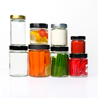 Vente en gros de pots à épices cylindriques en verre de 24 oz, 32 oz et 1 L avec couvercle noir