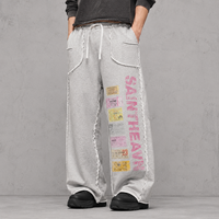 Pantalon de survêtement ample gris chiné en molleton de coton, coupe large, avec cordon de serrage, poches plaquées et imprimé graphique, style streetwear décontracté, OEM ODM