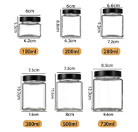 Pot de conservation carré en verre vide, avec couvercle hermétique en métal noir, pour la mise en conserve et l'emballage des aliments secs en cuisine